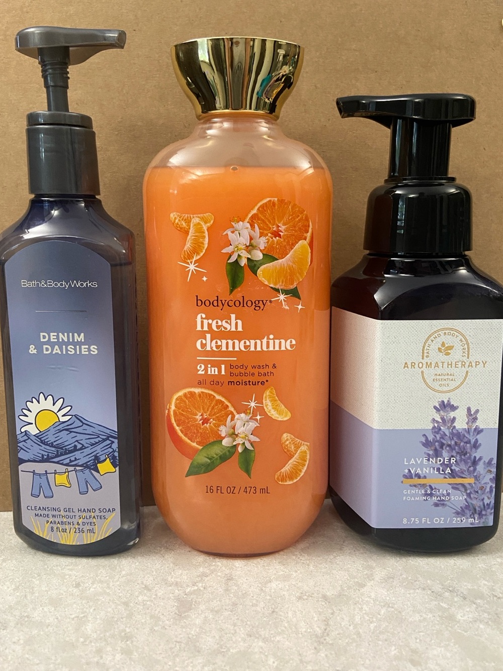 Bath & Body Works Hand Soap (2) and Bodycology Fresh Clementine 2-in-1 wash.